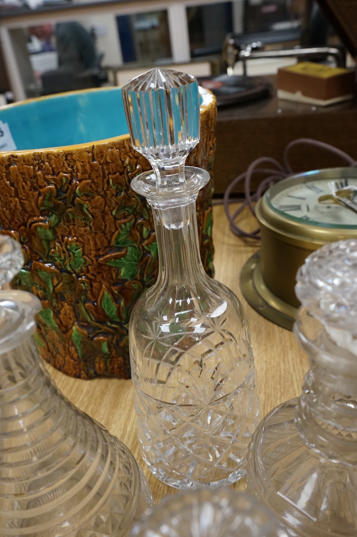 A collection of Regency and later glass decanters and stoppers, tallest 31cm
